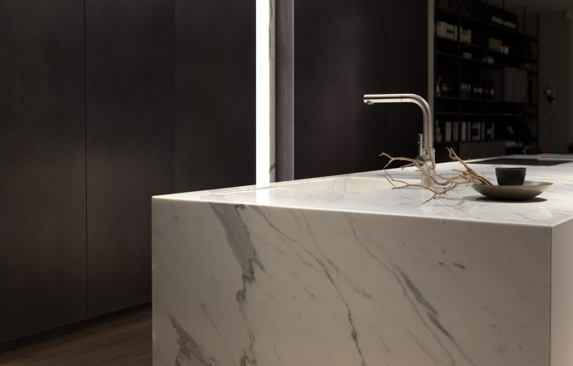 Stylish Solid White Marble Kitchen Counter With Dark Cupboards